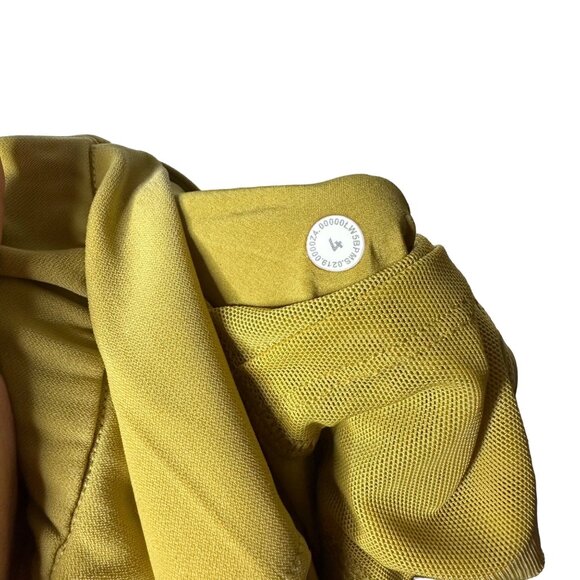 Lululemon On the Fly 7/8 Pant Size 4 Vintage Gold Mustard Yellow Woven - Picture 9 of 10